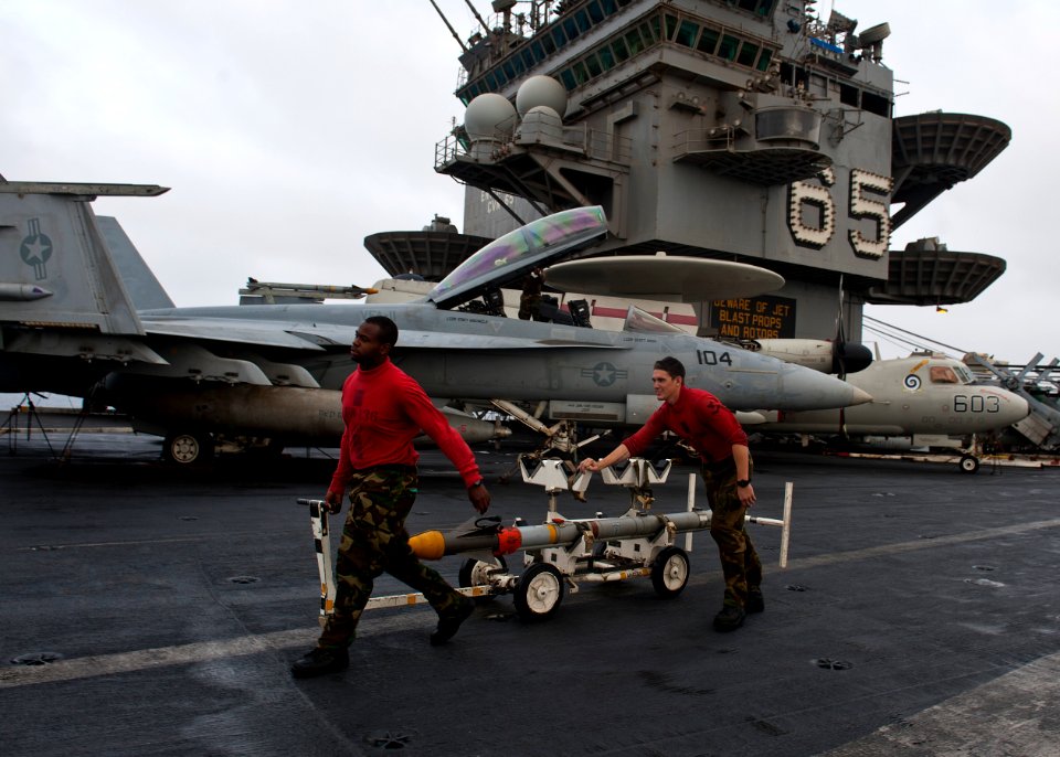 Flickr - Official U.S. Navy Imagery - Sailors move an Sidewinder missile.