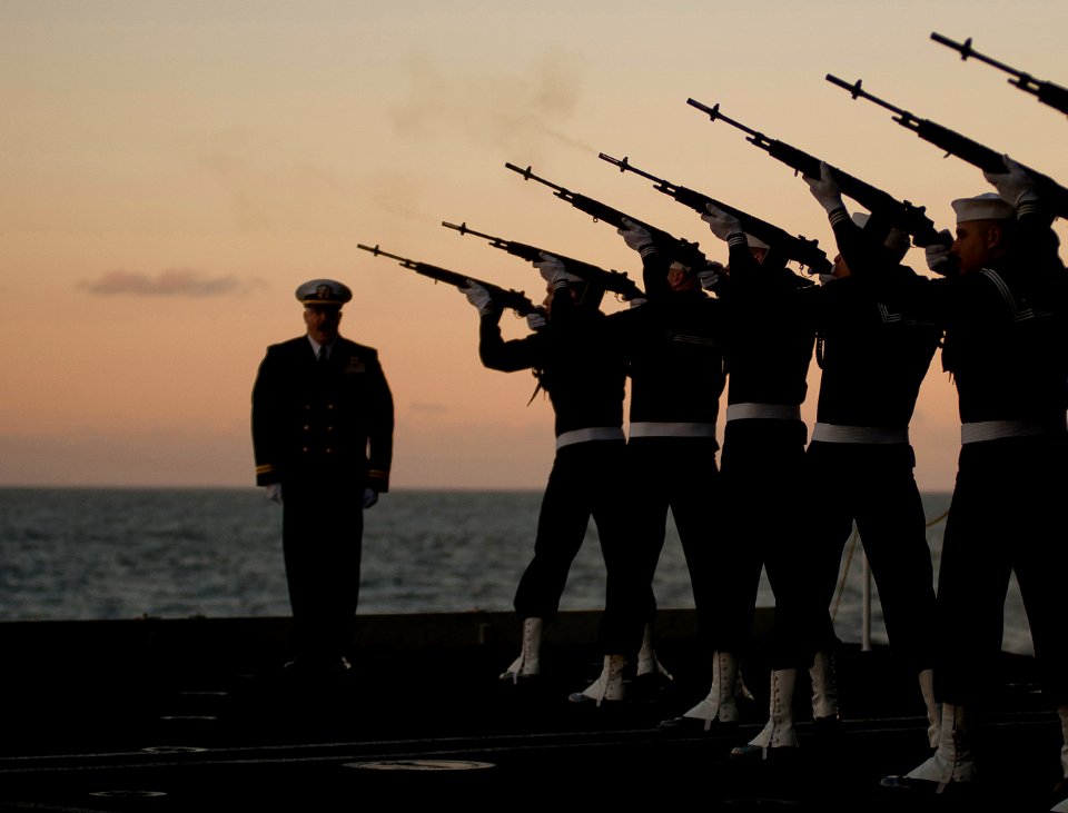 Flickr - Official U.S. Navy Imagery - Sailors on a rifle detail fire volleys during a burial at sea for 21 former service members aboard the Nimitz-class aircraft carrier USS Carl Vinson (CVN 70)
