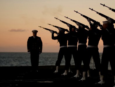 Flickr - Official U.S. Navy Imagery - Sailors on a rifle detail fire volleys during a burial at sea for 21 former service members aboard the Nimitz-class aircraft carrier USS Carl Vinson (CVN 70) photo