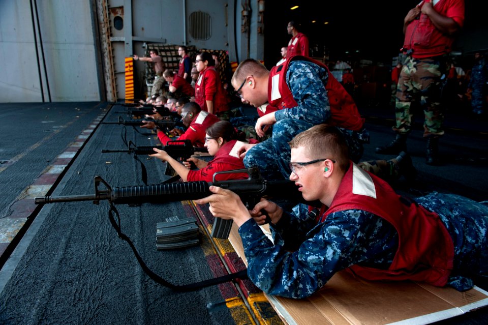 Flickr - Official U.S. Navy Imagery - Sailors participate in a small-arms qualification.