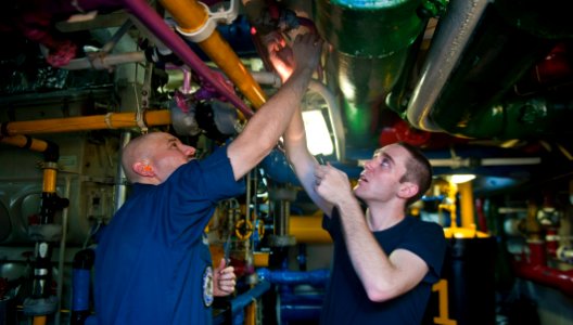Flickr - Official U.S. Navy Imagery - Sailors test the valve on a generator.