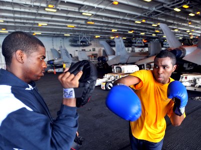 Flickr - Official U.S. Navy Imagery - Sailors participate in cardio boxing aboard USS Enterprise.