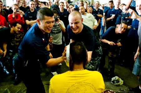 Flickr - Official U.S. Navy Imagery - Sailors participate in a pie-in-the-face game during a steel beach picnic.