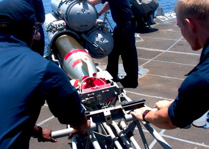 Flickr - Official U.S. Navy Imagery - Sailors perform routine maintenance on an MK-32 torpedo launcher.