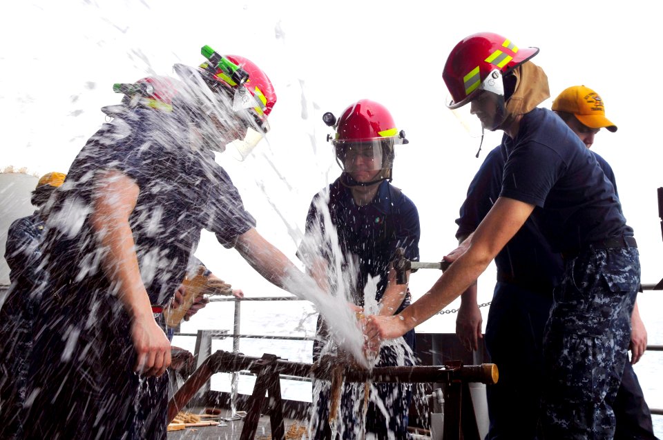 Flickr - Official U.S. Navy Imagery - Sailors patch a pipe during damage control training on the fantail of USS Ronald Reagan