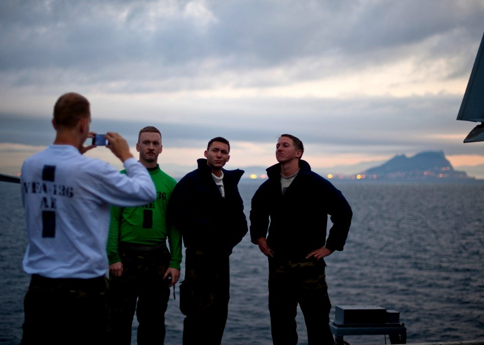 Flickr - Official U.S. Navy Imagery - Sailors pose in front of the Rock of Gibraltar.