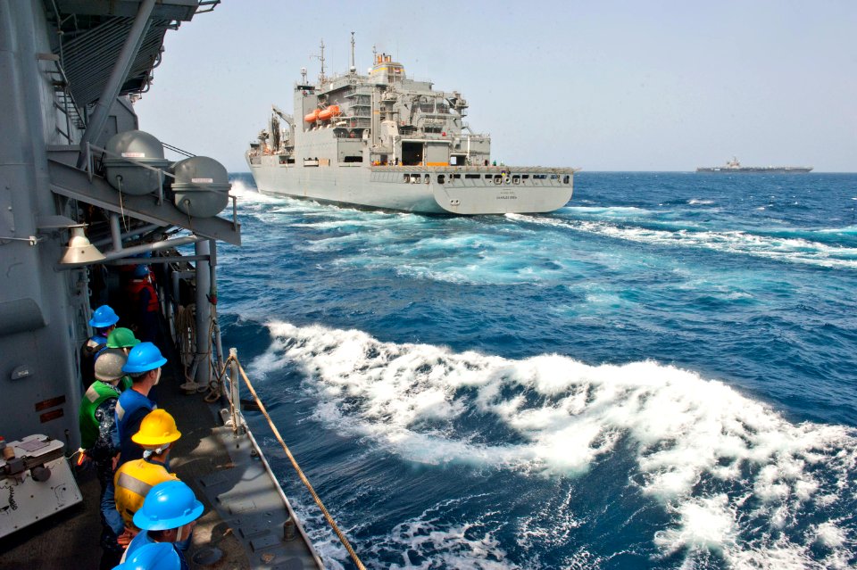 Flickr - Official U.S. Navy Imagery - Sailors wait in formation as the ship makes its approach alongside USNS Charles Drew.