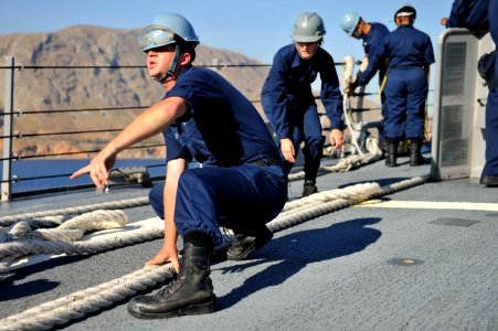 Flickr - Official U.S. Navy Imagery - Sailors prepare a mooring line.