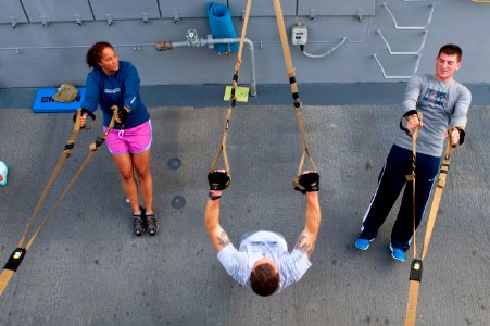 Flickr - Official U.S. Navy Imagery - Sailors work out using resistance bands.