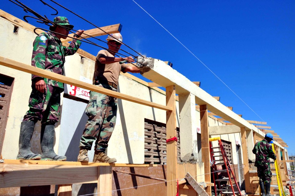 Flickr - Official U.S. Navy Imagery - Seabees make structural repairs to a school in Haiti.