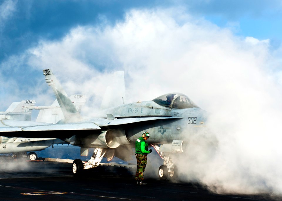 Flickr - Official U.S. Navy Imagery - Sailors prepare to launch a jet from USS John C. Stennis.