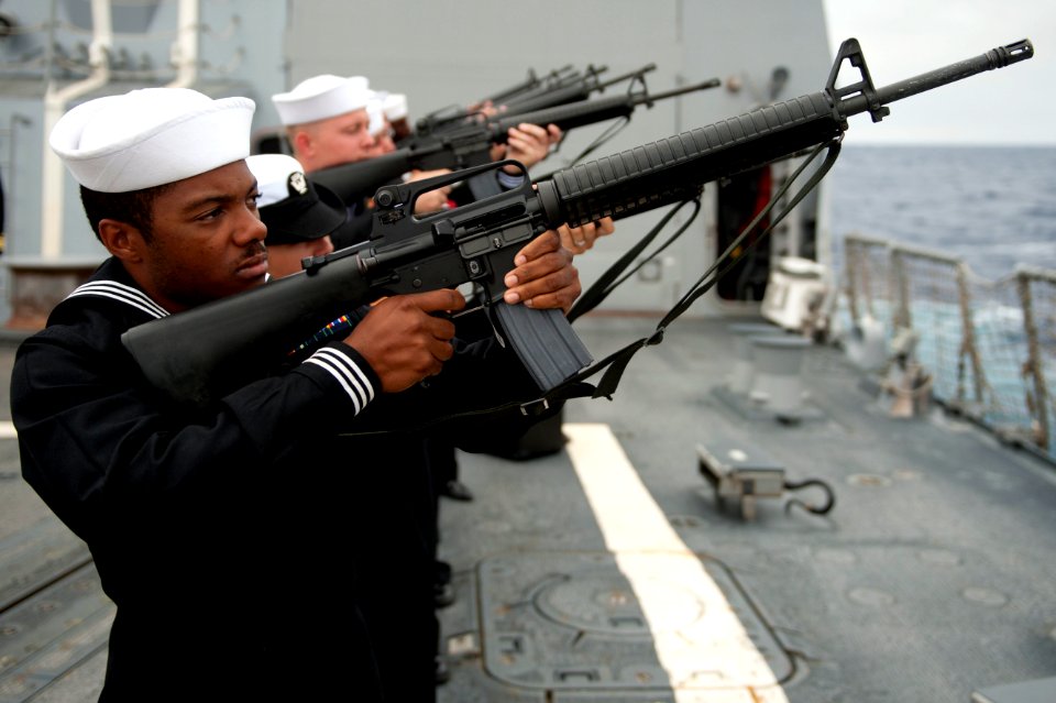 Flickr - Official U.S. Navy Imagery - Sailors render a 21-gun salute during a burial at sea ceremony.