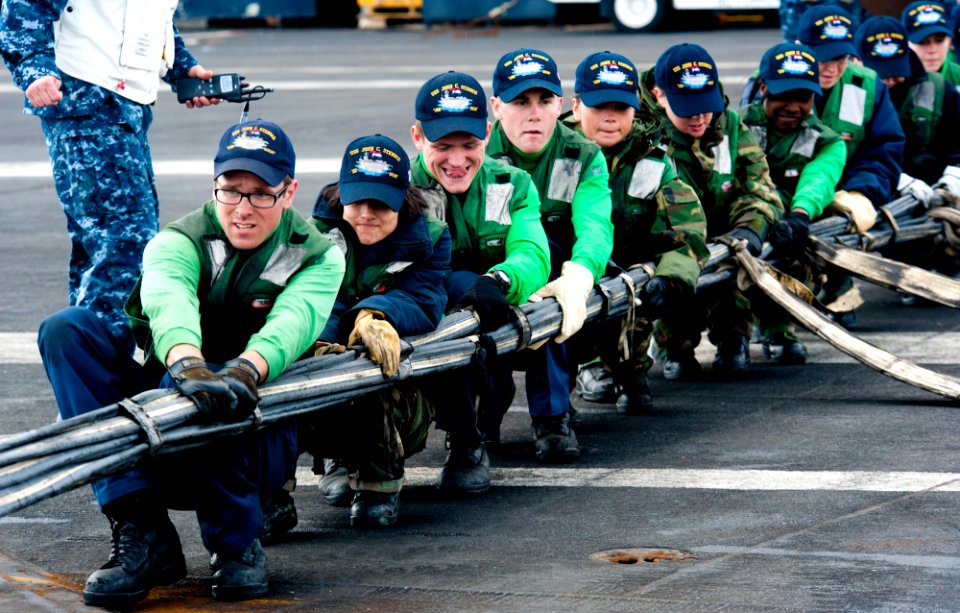 Flickr - Official U.S. Navy Imagery - Sailors rig the barricade during flight deck fire fighting drills. (2)