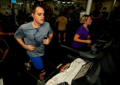 Flickr - Official U.S. Navy Imagery - Sailors run on treadmills aboard ship.