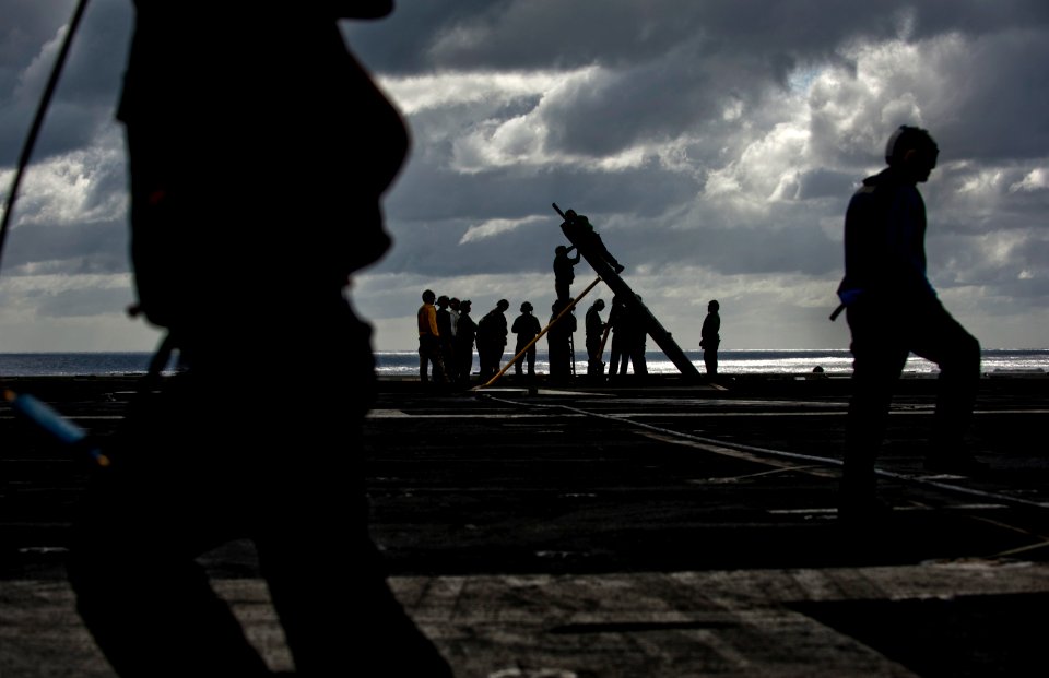 Flickr - Official U.S. Navy Imagery - Sailors repair a jet blast deflector between aircraft launches.