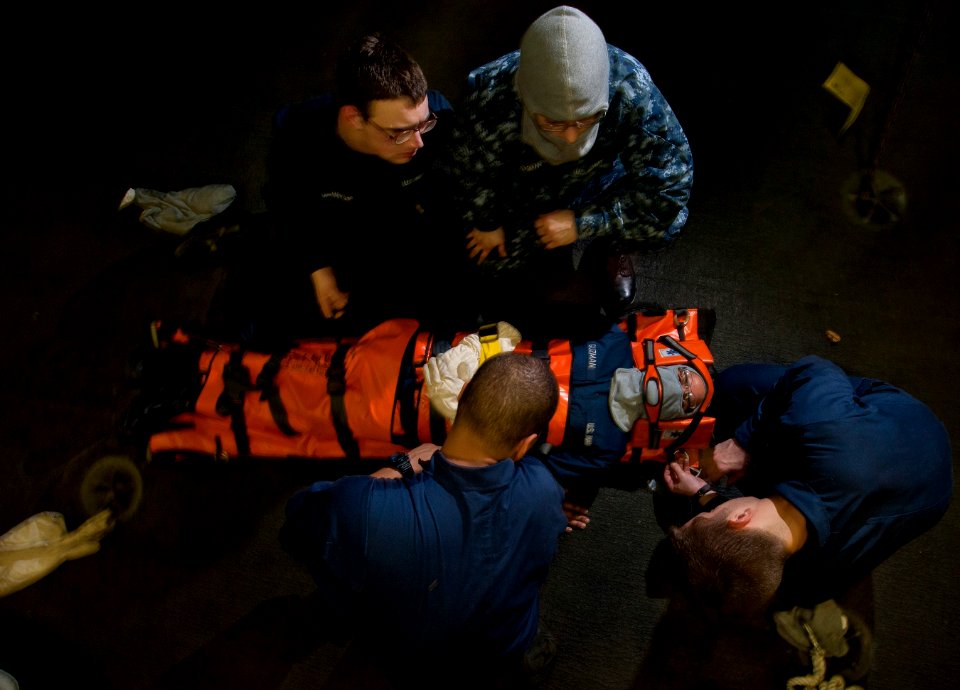 Flickr - Official U.S. Navy Imagery - Sailors secure shipmate in a Reeve Sleeve stretcher to simulate an injury.
