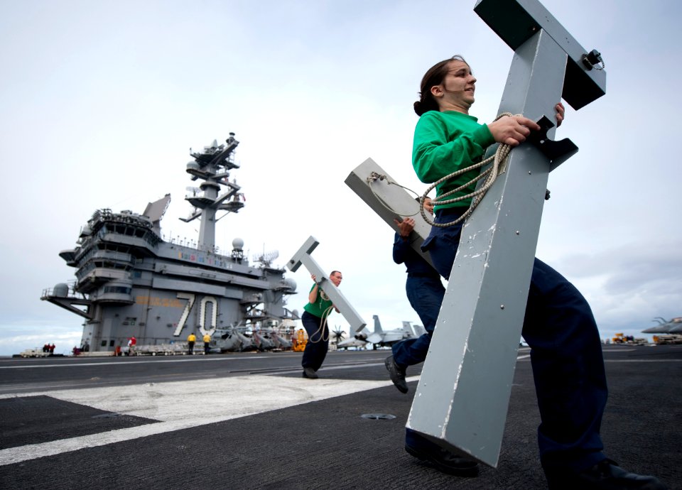 Flickr - Official U.S. Navy Imagery - Sailors set up visual landing aids aboard USS Carl Vinson.
