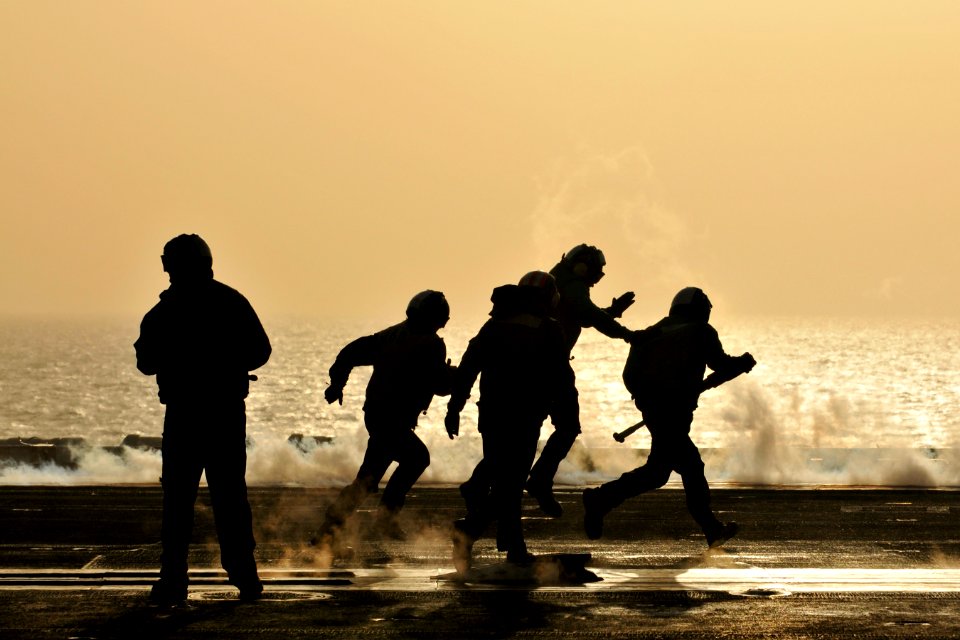 Flickr - Official U.S. Navy Imagery - Sailors secure the waist catapults after launching aircraft.
