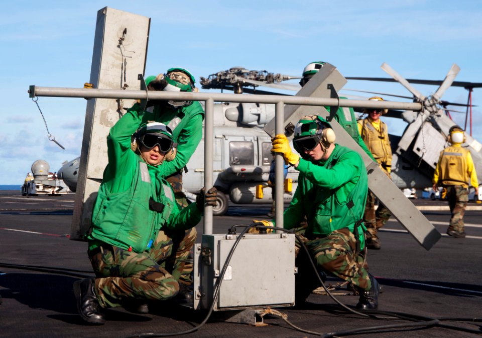 Flickr - Official U.S. Navy Imagery - Sailors set up landing system.