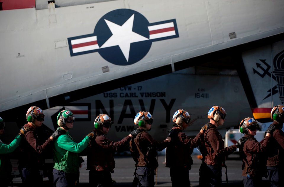 Flickr - Official U.S. Navy Imagery - Sailors stand by to relieve hose team members during flight deck firefighting drills.