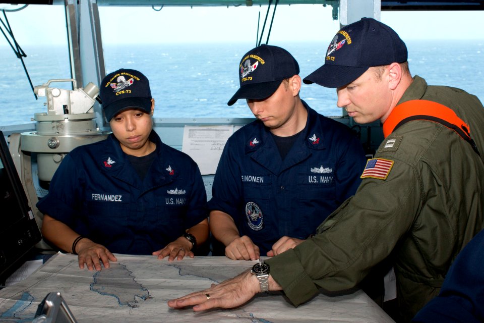 Flickr - Official U.S. Navy Imagery - Sailors study a navigational chart.