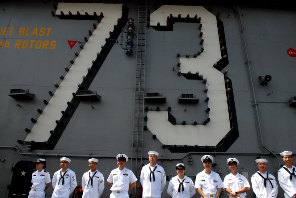 Flickr - Official U.S. Navy Imagery - Sailors take part in a press conference on the flight deck.
