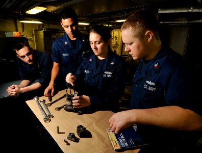 Flickr - Official U.S. Navy Imagery - Sailors train with valve for diesel generator
