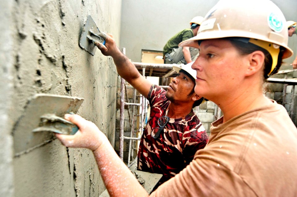 Flickr - Official U.S. Navy Imagery - Seabees put stucco on a wall.