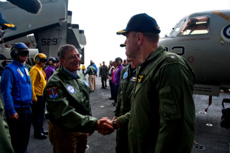 Flickr - Official U.S. Navy Imagery - Secretary of Defense Leon Panetta is greeted by Rear Adm. Dennis E. FitzPatrick.