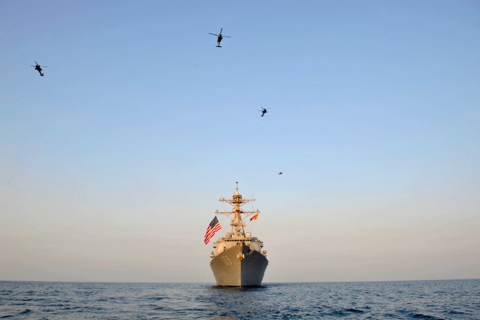 Flickr - Official U.S. Navy Imagery - SH-60B helicopters fly over USS Jason Dunham.