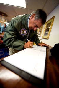 Flickr - Official U.S. Navy Imagery - The SECDEF signs a guest book.