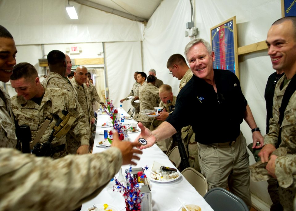 Flickr - Official U.S. Navy Imagery - The Secretary of the Navy hands out coins to Sailors and Marines during a visit to Camp Leatherneck.