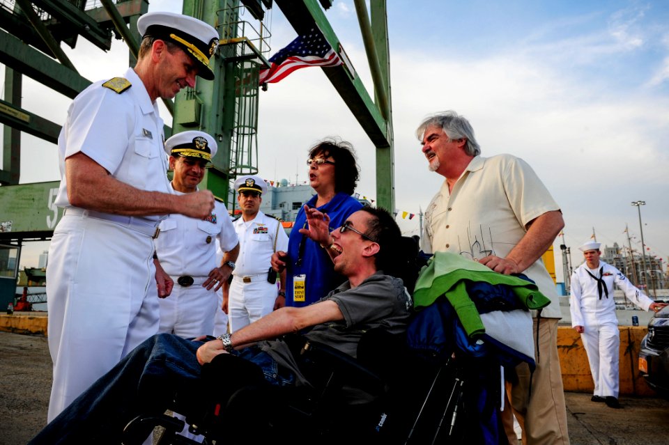 Flickr - Official U.S. Navy Imagery - The CNO presents his coin to a military supporter at the USO New York City Fleet Week block party.