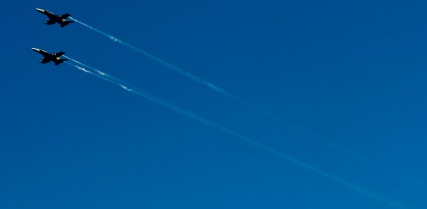 Flickr - Official U.S. Navy Imagery - Two F-A-18C Hornets fly overhead.