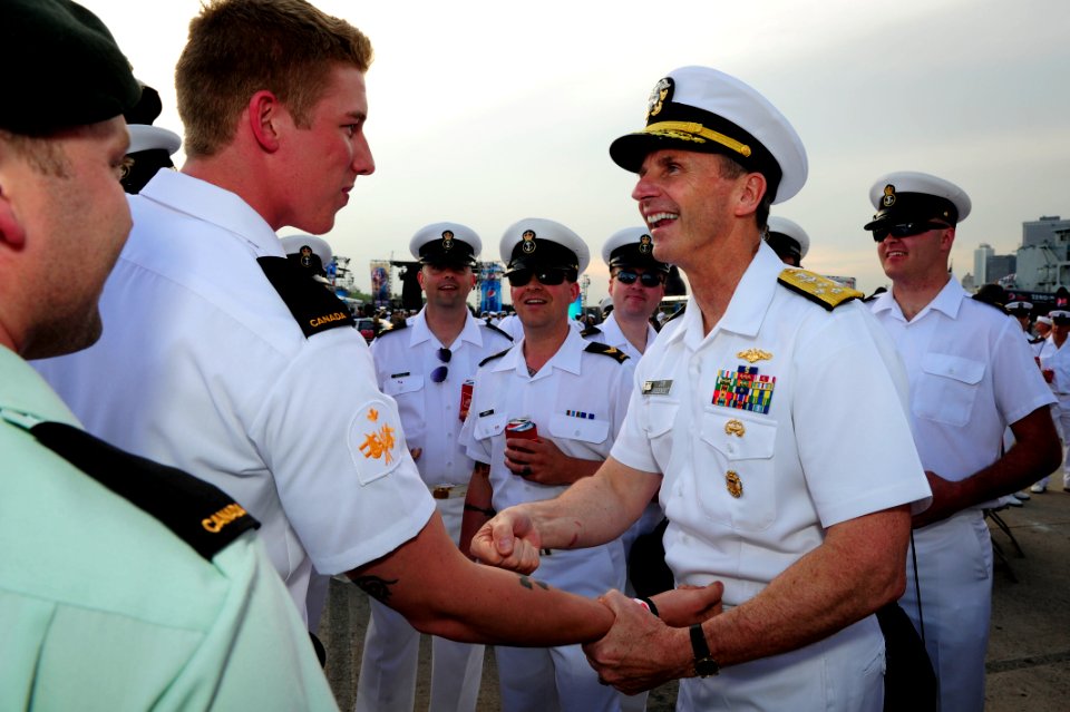 Flickr - Official U.S. Navy Imagery - The CNO shares a laugh with Royal Canadian Navy sailors at the USO New York City Fleet Week block party.