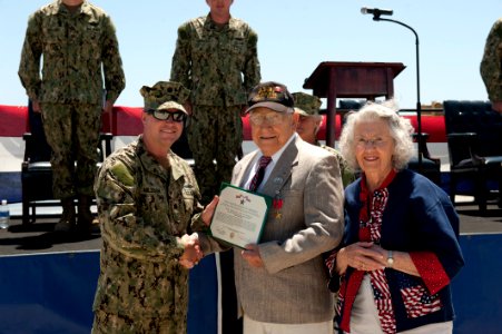 Flickr - Official U.S. Navy Imagery - The CO of Beachmaster Unit 1 presents retired Hospital Apprentice 1st Class Frank H. Walden with a Bronze Star.