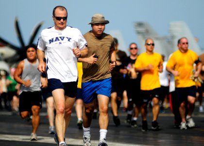 Flickr - Official U.S. Navy Imagery - The commander of Carrier Strike Group 9 participates in a 5K fun run on the flight deck.