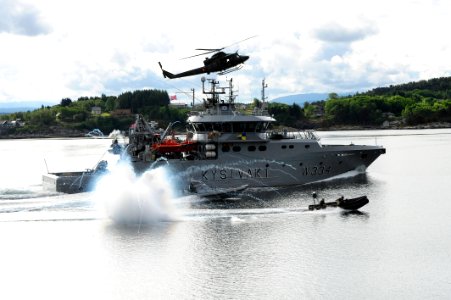 Flickr - Official U.S. Navy Imagery - The crew of Royal Norwegian Coast Guard patrol boat KV Tor simulates being a skiff taken over by pirates.