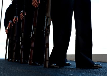 Flickr - Official U.S. Navy Imagery - The honor guard aboard USS Enterprise stands at parade rest during a burial at sea.