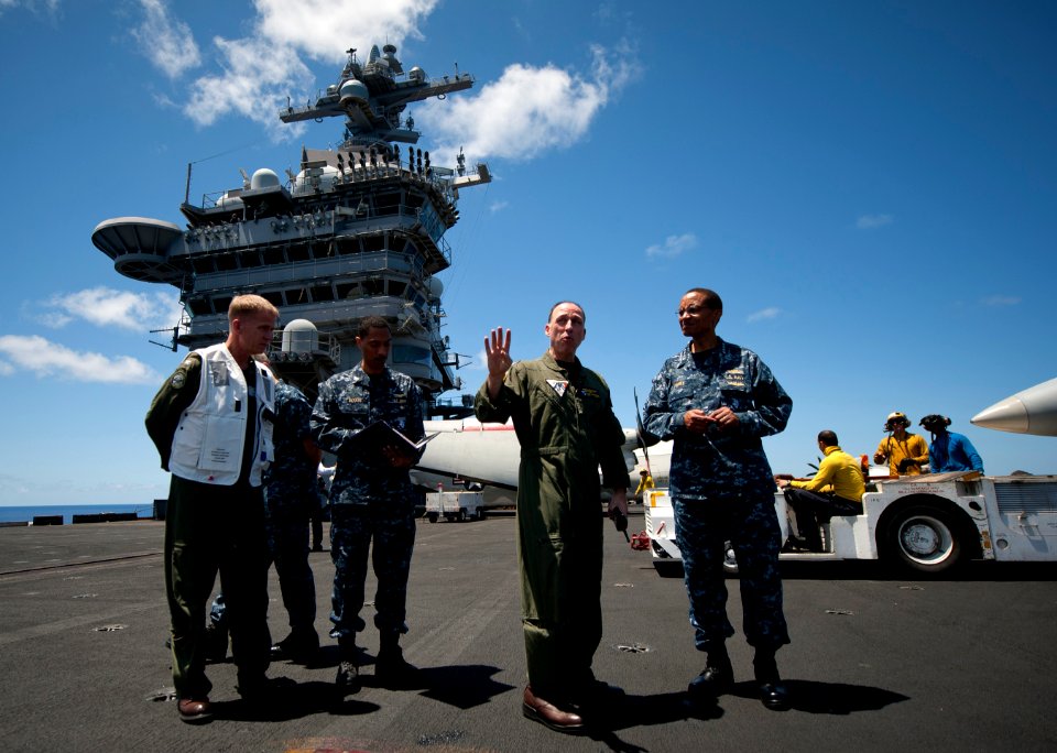 Flickr - Official U.S. Navy Imagery - The commander of the U.S. Pacific Fleet, speaks with the commander of Carrier Air Wing 17, on the flight deck.