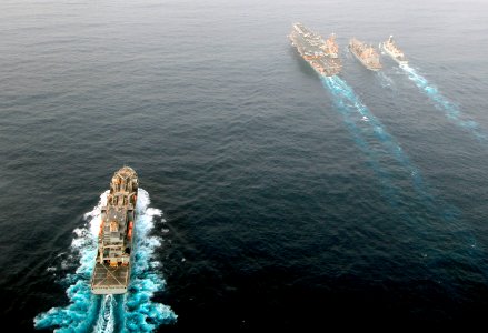 Flickr - Official U.S. Navy Imagery - USNS Charles Drew follows USS Abraham Lincoln, USNS Guadalupe and HMS Daring during a replenishment-at-sea.