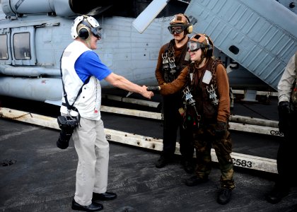 Flickr - Official U.S. Navy Imagery - The SECNAV greets Sailors on the flight deck.