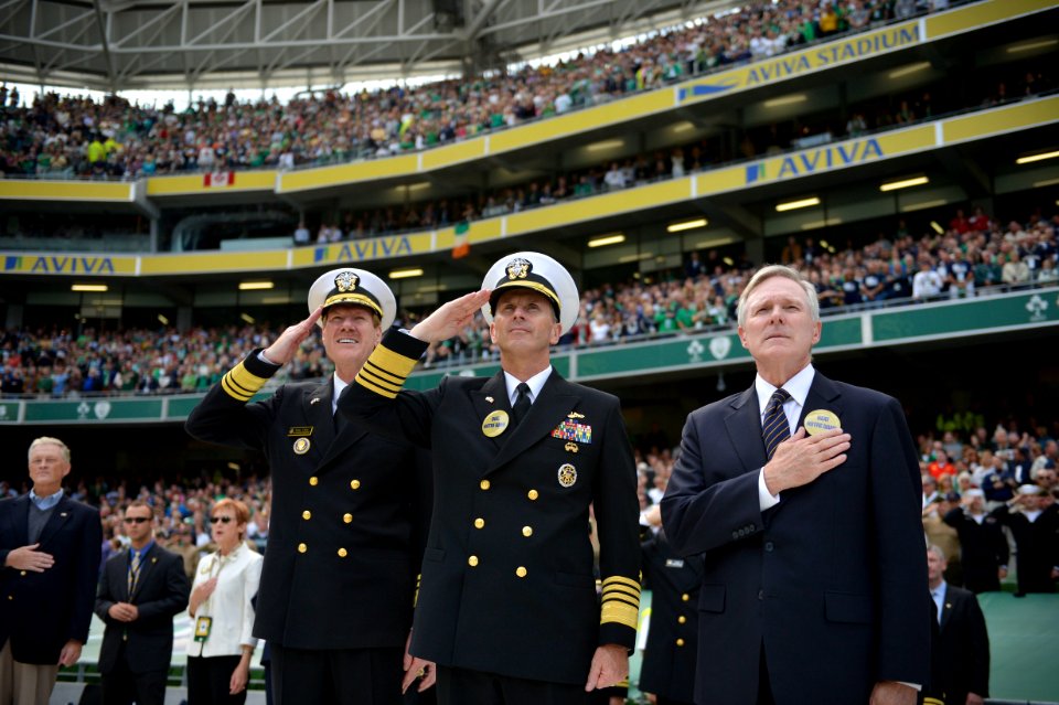 Flickr - Official U.S. Navy Imagery - The Superintendent, SECNAV and CNO salute and pay respect during the singing of the Irish and U.S. national anthems.