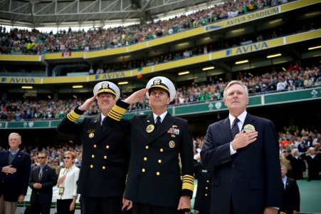 Flickr - Official U.S. Navy Imagery - The Superintendent, SECNAV and CNO salute and pay respect during the singing of the Irish and U.S. national anthems.