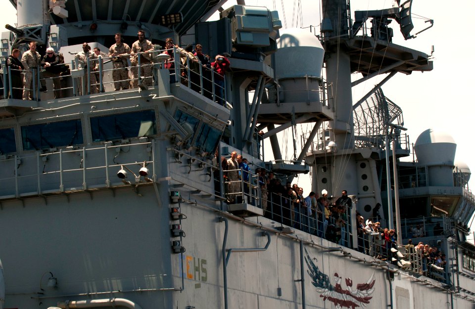 Flickr - Official U.S. Navy Imagery - Tiger Cruise participants watch an air power demonstration.