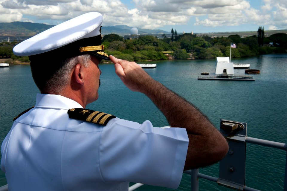 Flickr - Official U.S. Navy Imagery - The XO of USS Pearl Harbor salutes the USS Arizona Memorial as the ship passes it while entering port.