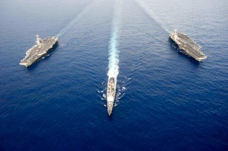 Flickr - Official U.S. Navy Imagery - Two Navy aircraft carriers together at sea.