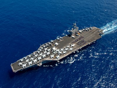 Flickr - Official U.S. Navy Imagery - Tiger cruise participants commemorate their voyage with a spell-out on the flight deck.