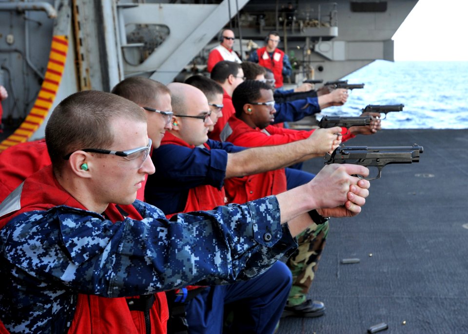 Flickr - Official U.S. Navy Imagery - USS Enterprise Sailors take part in 9 mm qualifications.