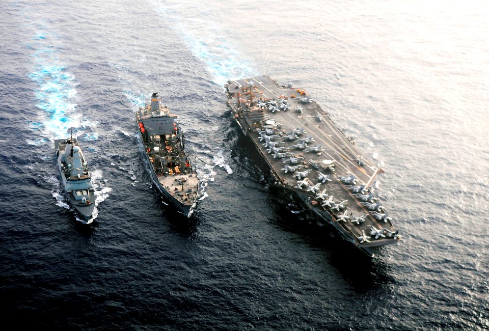 Flickr - Official U.S. Navy Imagery - USS Abraham Lincoln, USNS Guadalupe and HMS Daring conduct a replenishment-at-sea. (1)
